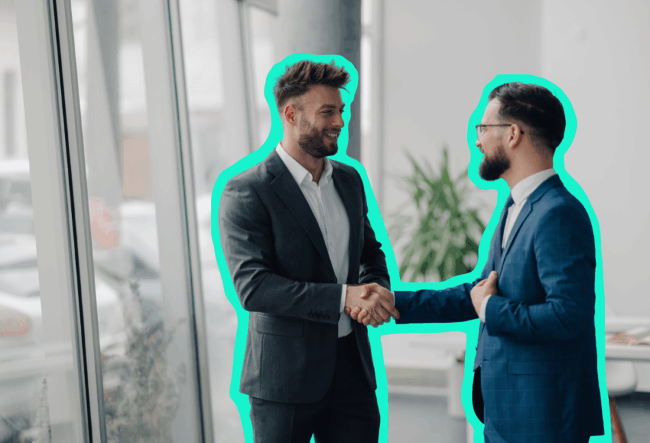 Two business men in suits shaking hands