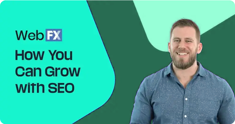 a man is smiling in front of a banner that says Seo-Mall.